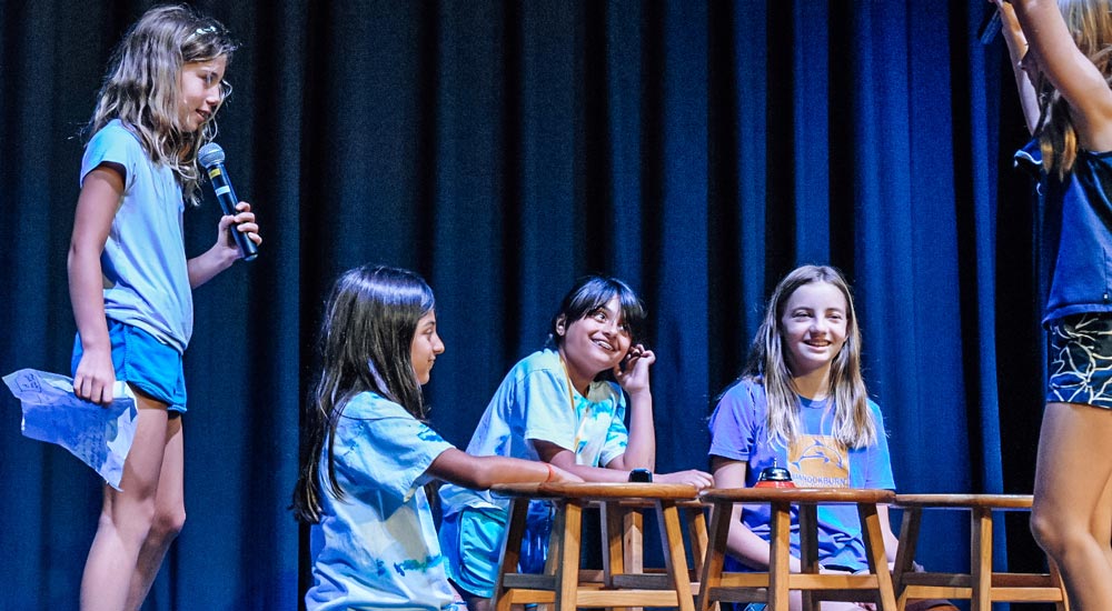 Girls performing an on-stage show